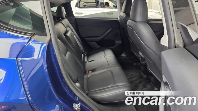 Tesla Model Y — Фото автомобиля 18