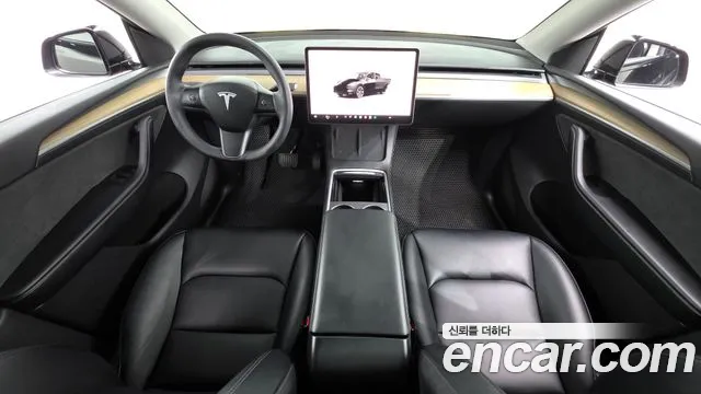 Tesla Model Y — Фото автомобиля 7