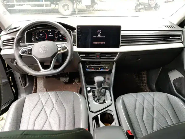 Volkswagen Tiguan L — Фото автомобиля 12