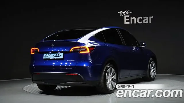Tesla Model Y — Фото автомобиля 2