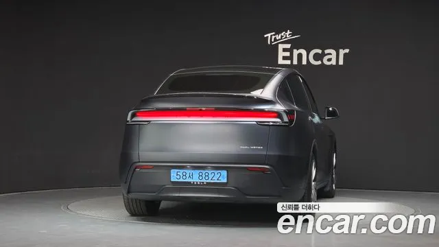 Tesla Model Y — Фото автомобиля 4