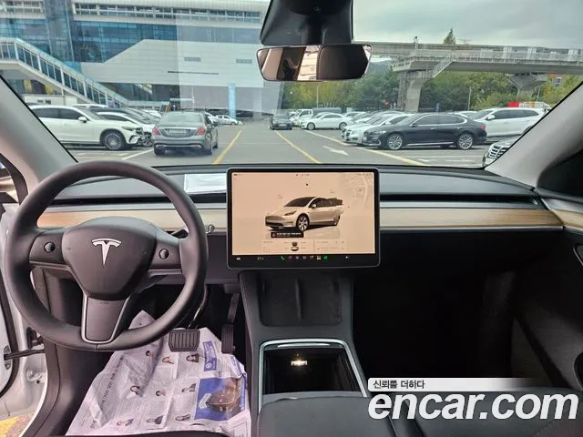 Tesla Model Y — Фото автомобиля 10