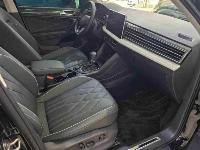Volkswagen Tiguan L — Фото автомобиля 16