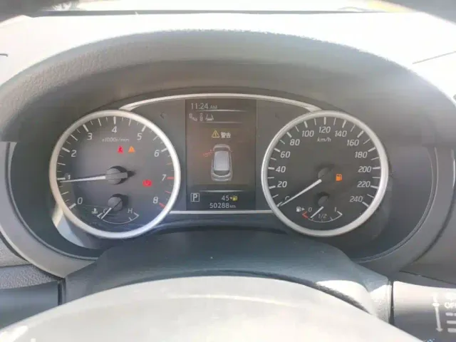 Nissan Tiida — Фото автомобиля 11