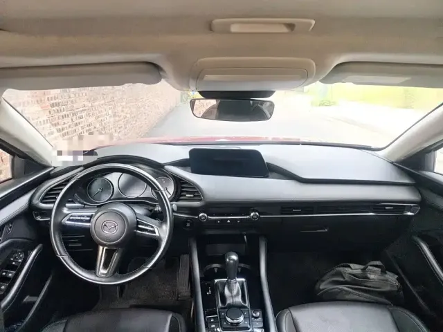 Mazda Axela — Фото автомобиля 5