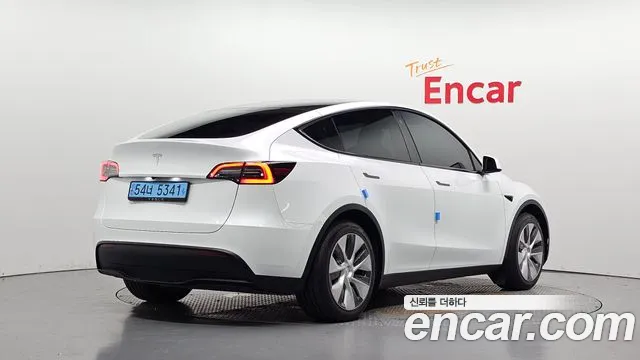 Tesla Model Y — Фото автомобиля 2