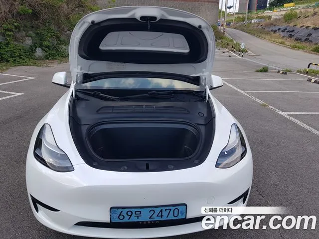 Tesla Model Y — Фото автомобиля 6