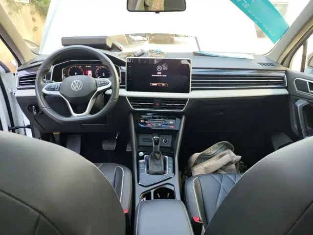 Volkswagen Tiguan L — Фото автомобиля 9