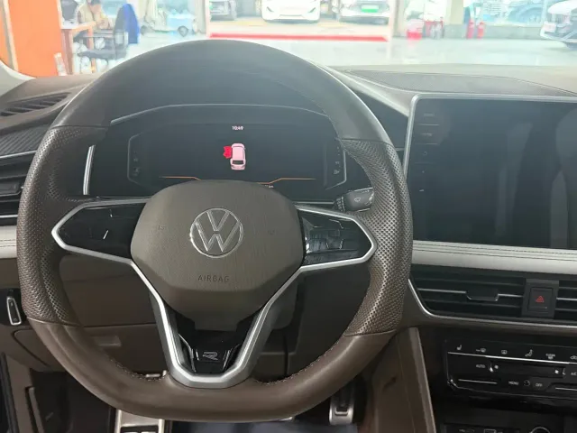 Volkswagen Tiguan L — Фото автомобиля 8