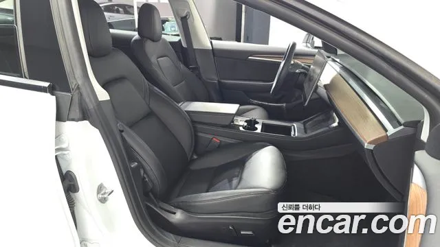 Tesla Model 3 — Фото автомобиля 26
