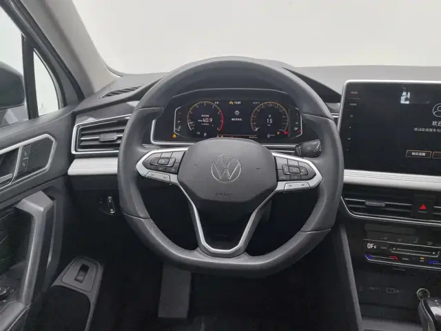 Volkswagen Tiguan L — Фото автомобиля 11