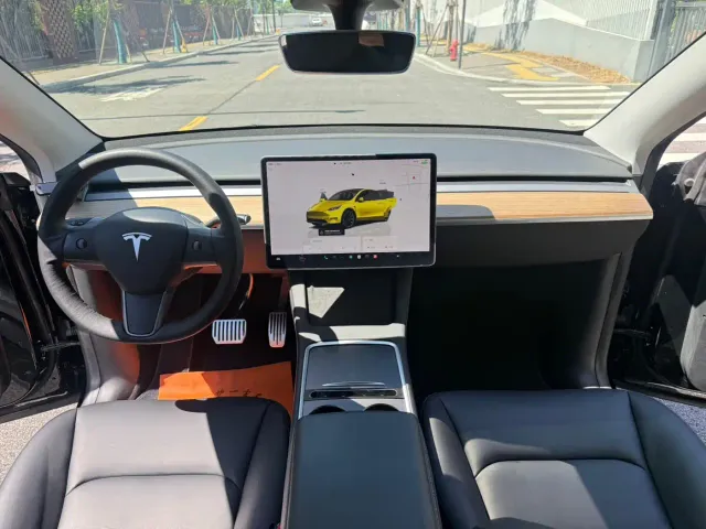 Tesla Model Y — Фото автомобиля 6