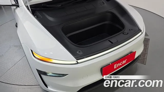 Tesla Model Y — Фото автомобиля 9