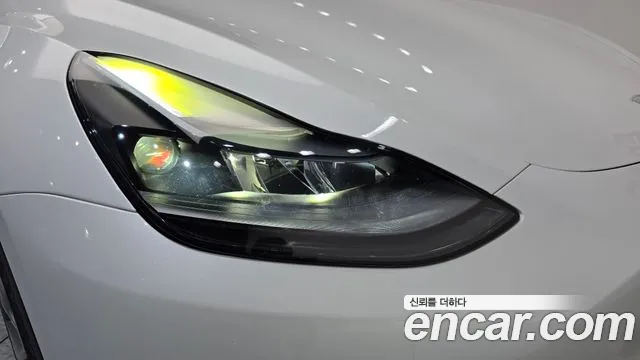 Tesla Model Y — Фото автомобиля 7