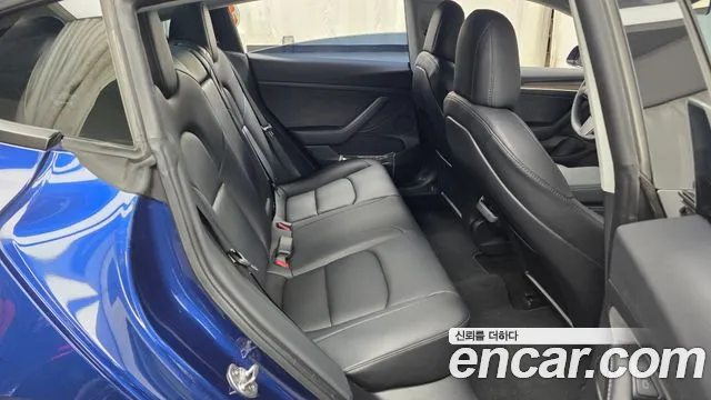 Tesla Model 3 — Фото автомобиля 18