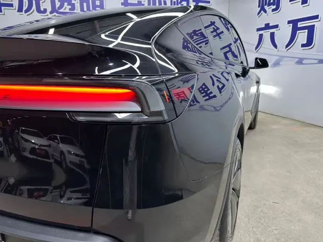 Tesla Model Y — Фото автомобиля 16