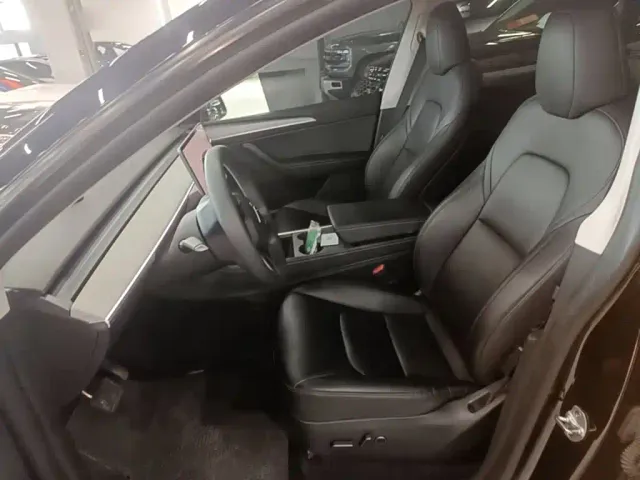 Tesla Model Y — Фото автомобиля 14