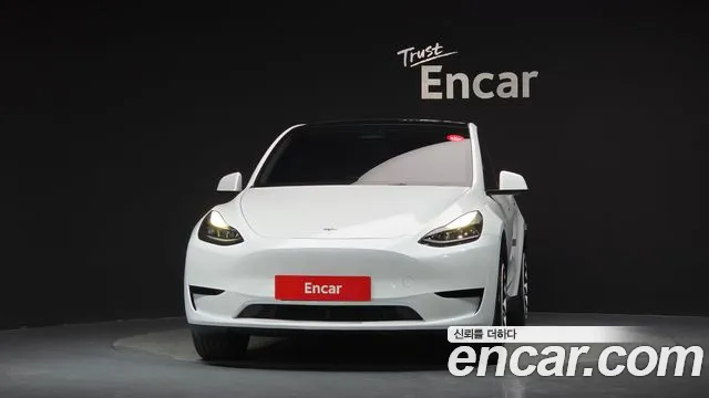 Tesla Model Y — Фото автомобиля 3
