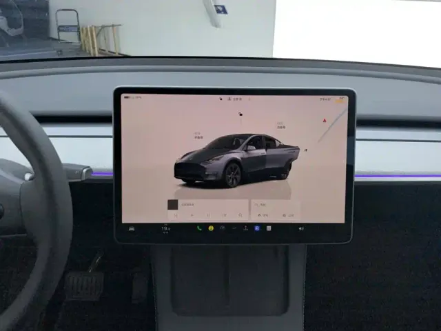 Tesla Model Y — Фото автомобиля 13