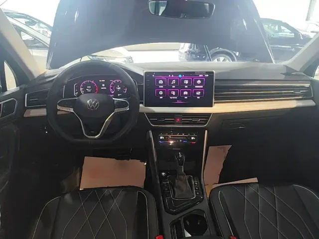 Volkswagen Tiguan L — Фото автомобиля 9