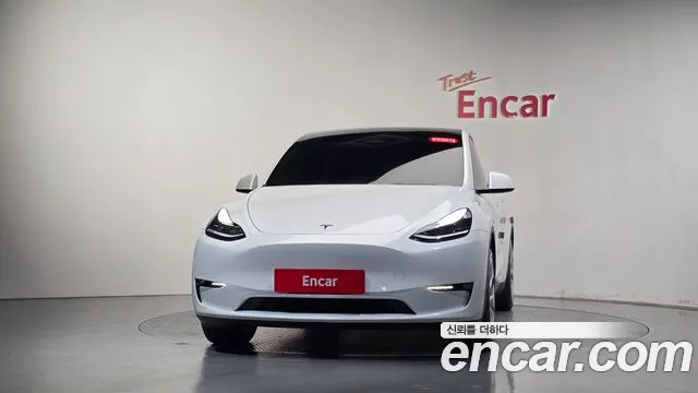 Tesla Model Y — Фото автомобиля 3