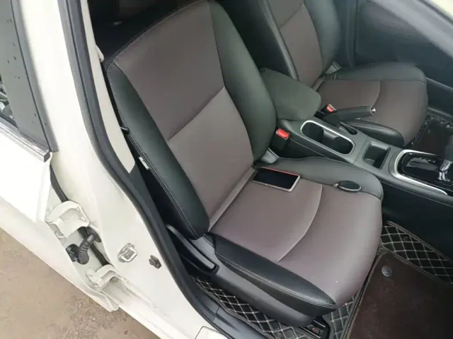 Nissan Tiida — Фото автомобиля 24