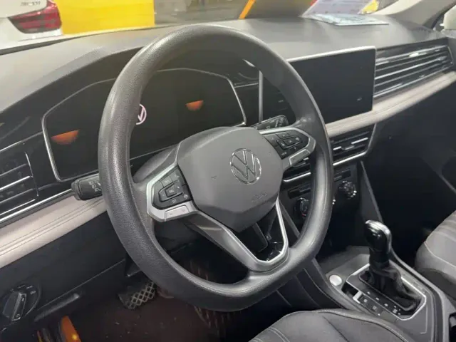 Volkswagen Tiguan L — Фото автомобиля 3