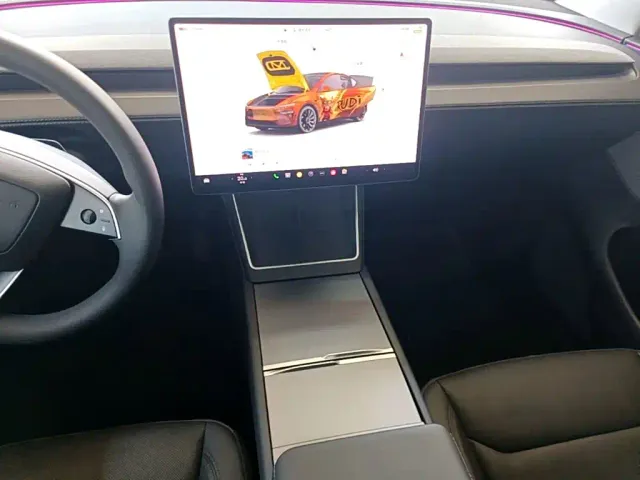 Tesla Model Y — Фото автомобиля 12