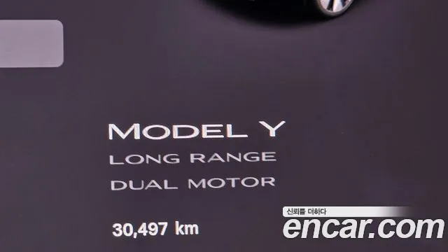 Tesla Model Y — Фото автомобиля 11