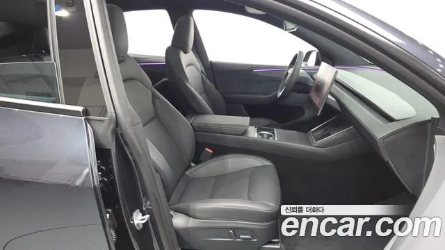 Tesla Model Y — Фото автомобиля 26