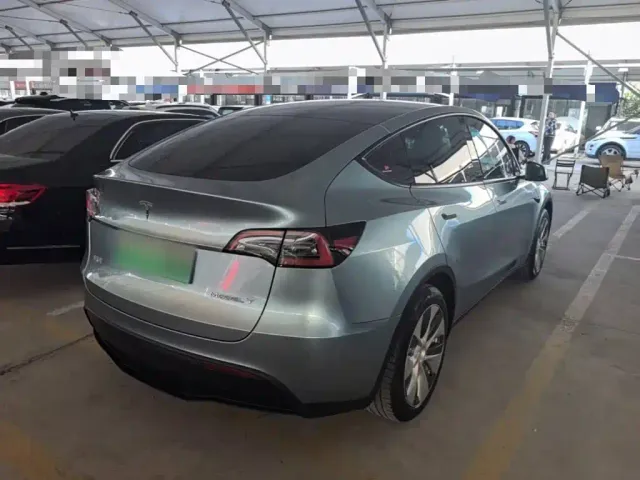 Tesla Model Y — Фото автомобиля 6