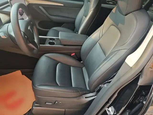 Tesla Model Y — Фото автомобиля 14