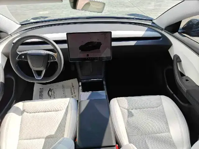 Tesla Model 3 — Фото автомобиля 6