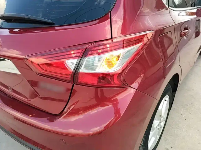 Nissan Tiida — Фото автомобиля 7