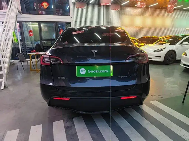 Tesla Model Y — Фото автомобиля 5