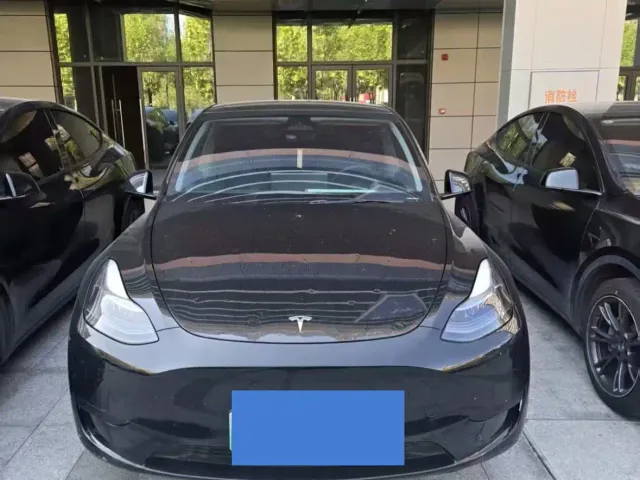 Tesla Model Y — Фото автомобиля 6