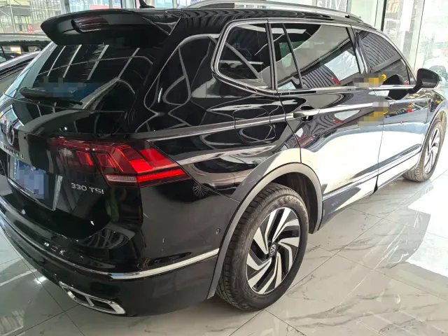 Volkswagen Tiguan L — Фото автомобиля 6