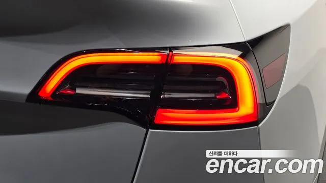 Tesla Model Y — Фото автомобиля 7