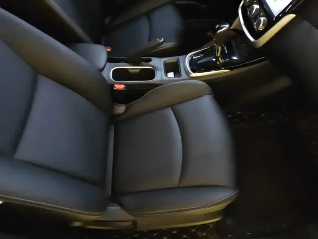 Nissan Tiida — Фото автомобиля 24