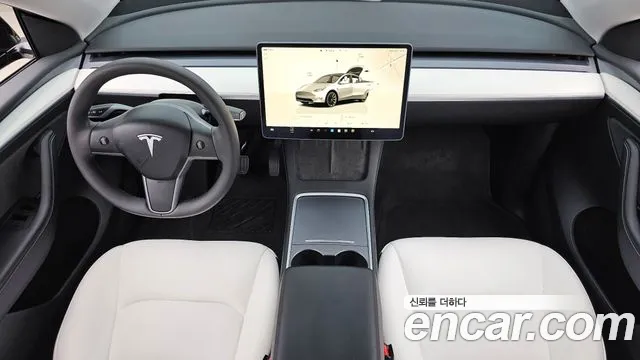 Tesla Model Y — Фото автомобиля 7