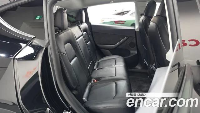 Tesla Model Y — Фото автомобиля 23