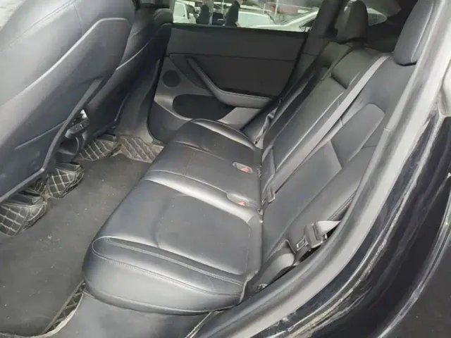 Tesla Model Y — Фото автомобиля 16