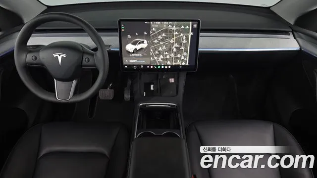 Tesla Model Y — Фото автомобиля 10