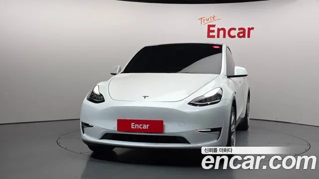 Tesla Model Y — Фото автомобиля 3