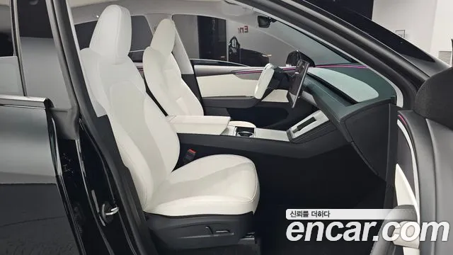 Tesla Model Y — Фото автомобиля 25