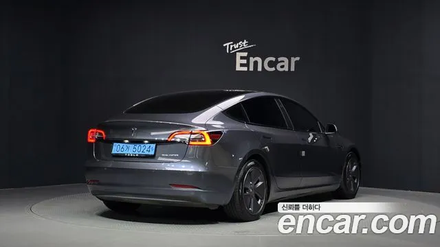 Tesla Model 3 — Фото автомобиля 2