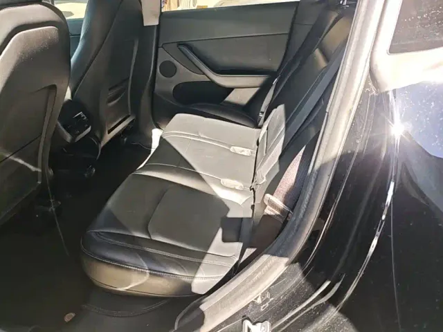 Tesla Model Y — Фото автомобиля 12