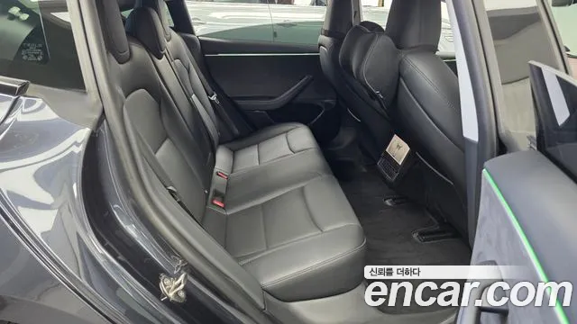 Tesla Model 3 — Фото автомобиля 12