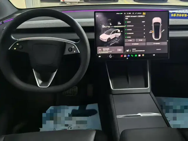 Tesla Model Y — Фото автомобиля 13