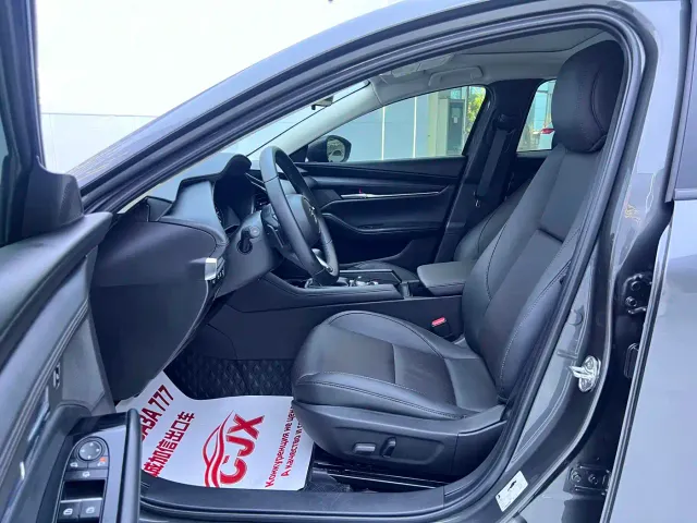 Mazda Axela — Фото автомобиля 7
